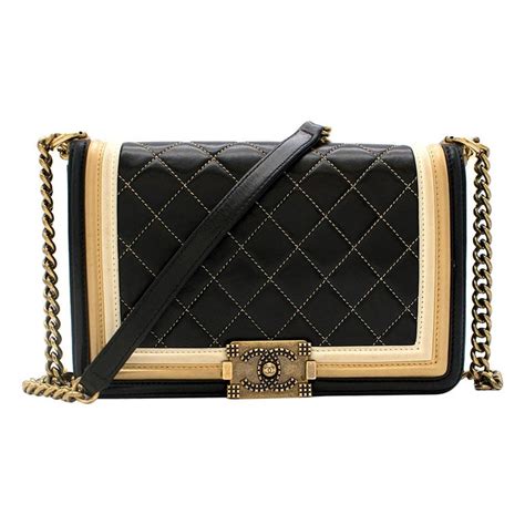 chanel led black and gold boy bag|Chanel Boy Bag: Your Guide to Sizes, Styles, Prices .